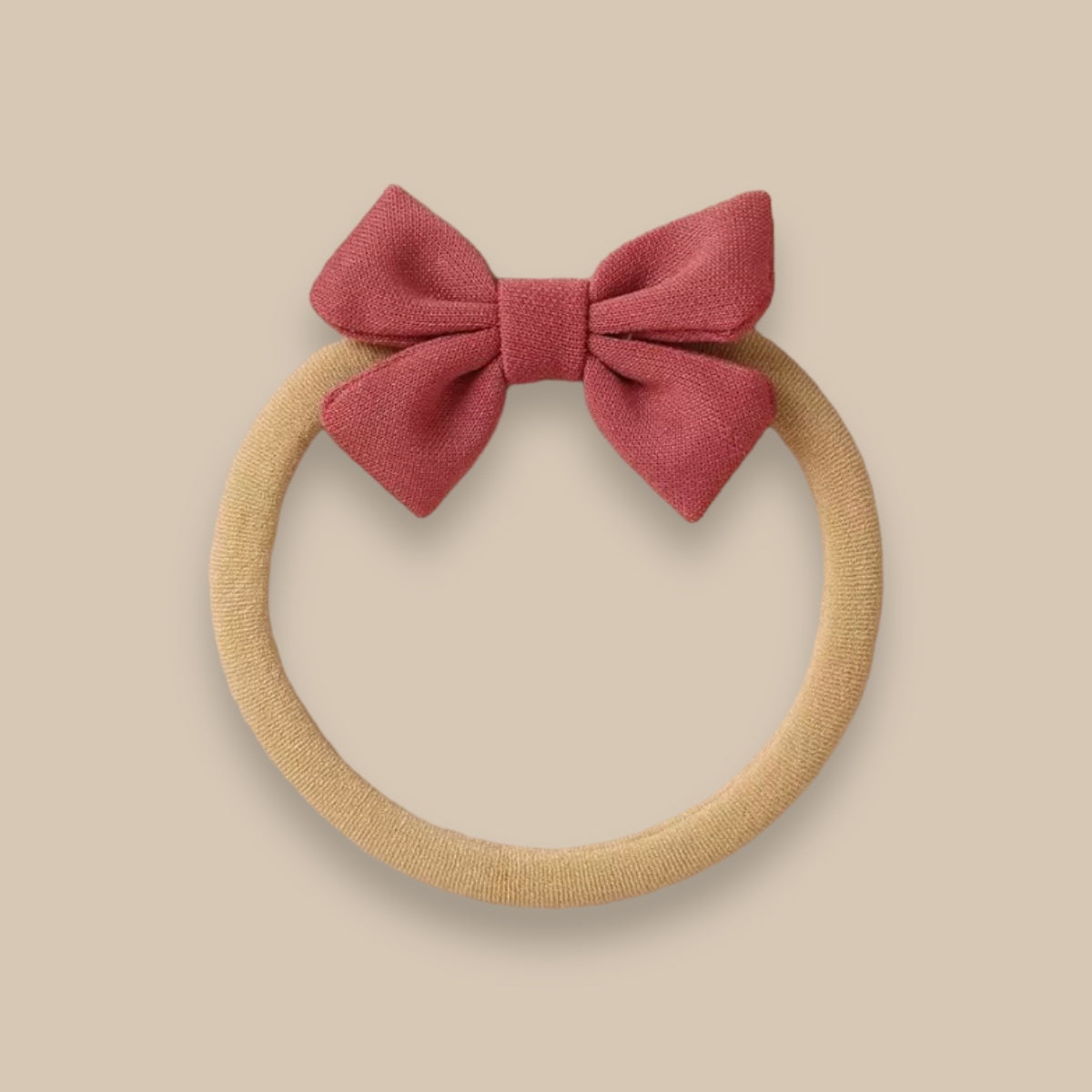 CERCHIETTO ELASTICO CON FIOCCO (Rosa Corallo)